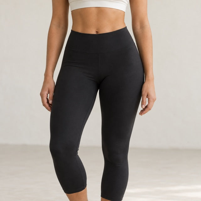 Model wearing black high-waist leggings